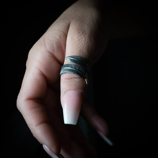 Pluma de plata.